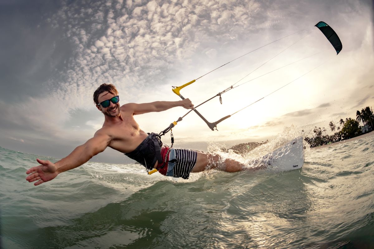 Fast,Kite,Surfer,Rides,At,Sunset,Sea,Beach.,Close,Up